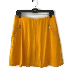 Tail Women's Isma 18" Golf Long Athletic Skort Neon bright Orange Size M Vivid